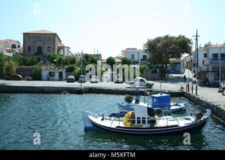 Fishing boats in the harbour of Sigri Stock Photo