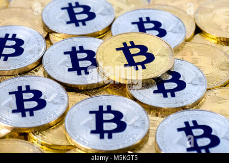 Many Bitcoins with silver and cold color, selective focus on single coin, cryptocurrency concept or financial background Stock Photo