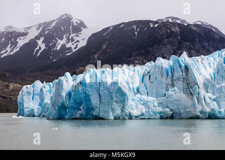 Rugged face of Glaciar Grey melts and calves into Lago Grey; Torres del Paine National Park; Patagonia; Chile Stock Photo