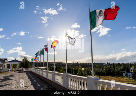 International flags flying; Hotel Unique Luxury; El Calafate; Argentina Stock Photo