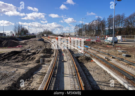 First section of tram tracks to be laid on the Metrolink Trafford Park Line, Parkway, Trafford Park, Manchester, UK Stock Photo