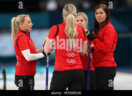 Great Britain's skipper Eve Muirhead (right) with teammates Anna Sloan (left), Lauren Gray and Vicki Adams during the Women's Bronze Medal match at the Gangneung Curling Centre during day fifteen of the PyeongChang 2018 Winter Olympic Games in South Korea. Stock Photo