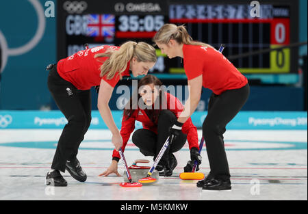 Great Britain's skipper Eve Muirhead watches as Lauren Gray and Vicki Adams sweep during the Women's Bronze Medal match at the Gangneung Curling Centre during day fifteen of the PyeongChang 2018 Winter Olympic Games in South Korea. Stock Photo