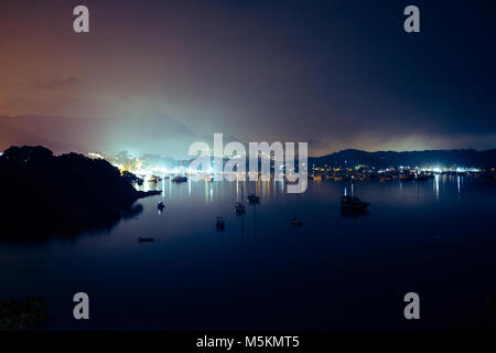 The view across Hebe Haven in Sai Kung, Hong Kong at night Stock Photo