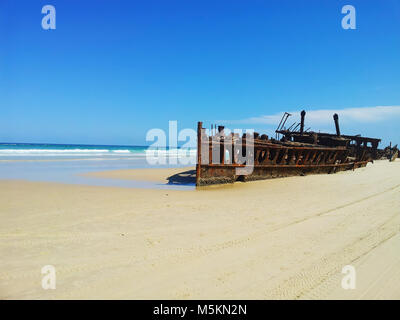 An old Shipwreck at the beach in Fraser Island, Queensland, Australien Stock Photo