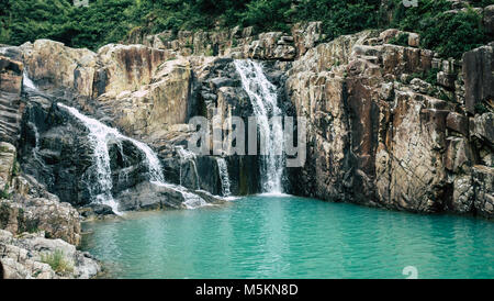 A hidden waterfall in Sai Kung National Park, Hong Kong Stock Photo