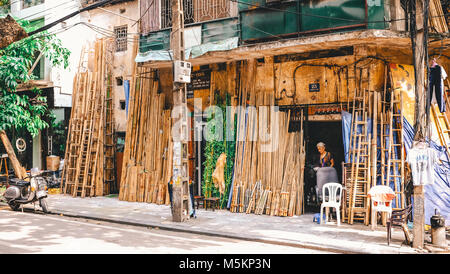 Busy streets are full of traffic and market traders in Hanoi, Vietnam Stock Photo