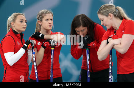 Great Britain's skipper Eve Muirhead (second right) and team mates Anna Sloan, Lauren Gray and Vicki Adams look dejected after losing the Women's Bronze Medal match at the Gangneung Curling Centre during day fifteen of the PyeongChang 2018 Winter Olympic Games in South Korea. Stock Photo