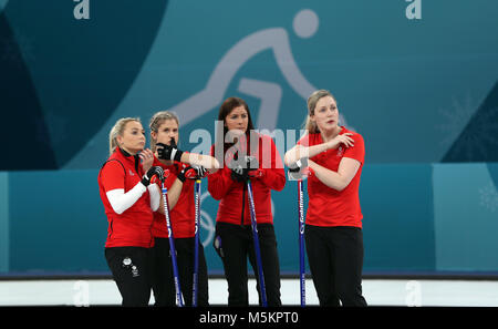 Great Britain's skipper Eve Muirhead (second right) and team mates Anna Sloan, Lauren Gray and Vicki Adams look dejected during the Women's Bronze Medal match at the Gangneung Curling Centre during day fifteen of the PyeongChang 2018 Winter Olympic Games in South Korea. Stock Photo