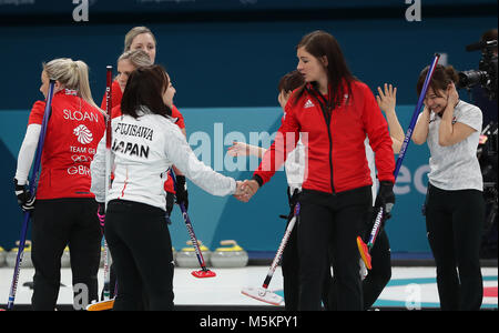 Great Britain's skipper Eve Muirhead shakes hands with Japan's Satsuki Fujisawa after losing the Women's Bronze Medal match at the Gangneung Curling Centre during day fifteen of the PyeongChang 2018 Winter Olympic Games in South Korea. Stock Photo