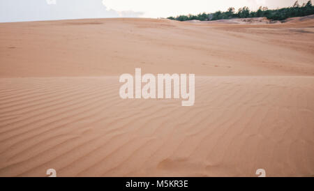 Empty sand dunes of Mue Ne in Vietnam during sunset Stock Photo