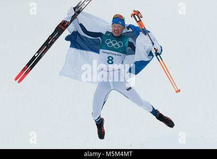 Pyeongchang, South Korea. 24th Feb, 2018. Cross Country skier LIVO NISKANEN of Finland celebrates after winning the gold medal in the Cross-Country Skiing Men's 50km Mass Start Classic at the PyeongChang 2018 Winter Olympic Games at Alpensia Cross-Country Skiing Centre. Credit: Paul Kitagaki Jr./ZUMA Wire/Alamy Live News Stock Photo