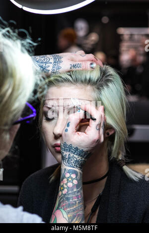 Brighton, UK, 24 Feb 2018. Tattoo artists from around the world, gathered at the Brighton Centre UK, for the 11th annual Brighton Tattoo Convention.  Credit: Matt Duckett/ImagesLive/ZUMA Wire/Alamy Live News Stock Photo