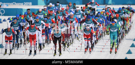 Pyeongchang, South Korea. 24th Feb, 2018. Skiers begin the 50 kms race in Pyeongchang, South Korea, 24 February 2018. Credit: Hendrik Schmidt/dpa-Zentralbild/dpa/Alamy Live News Stock Photo