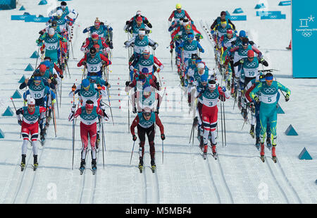 Gangneung, South Korea. 24th Feb, 2018. The start of the Cross-Country Skiing Men's 50km Mass Start Classic at the PyeongChang 2018 Winter Olympic Games at Gangneung Oval on Saturday February 24, 2018. Credit: Paul Kitagaki Jr./ZUMA Wire/Alamy Live News Stock Photo