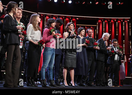 Berlin, Germany. 24th Feb, 2018. Winners pose for photos during the awards ceremony of the 68th Berlin International Film Festival, in Berlin, Germany, on Feb. 24, 2018. Credit: Shan Yuqi/Xinhua/Alamy Live News