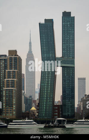 The American Copper Buildings and Empire State Building at sunset ...