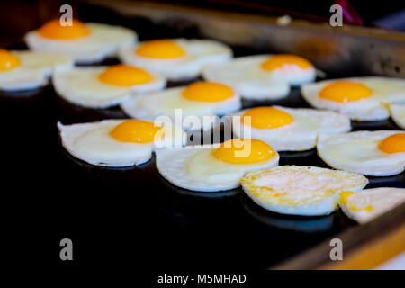 Fried egg heart shape Stock Photo
