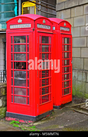 This pair of K6 type telephone boxes are located outside the former head Post Office in Court Road Bridgend,S.Wales.They are Grade II Listed. Stock Photo