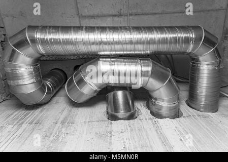 Ventilation ducts. many of the same bent metal components the air duct. Aluminum air pipe for air duct Stock Photo