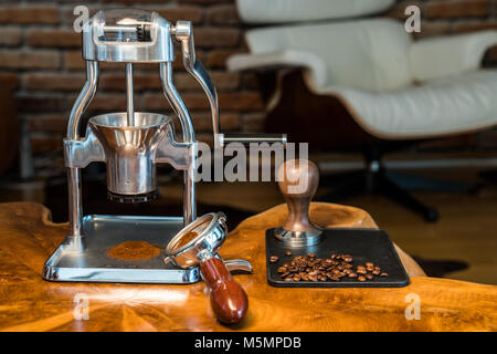 Espresso Grinder - Barista in Living Room Stock Photo