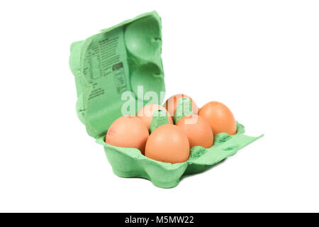 A dozen large eggs in green egg box insulted white background Stock Photo