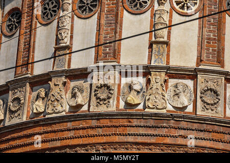 Detail of decoration and sculptures outside the church of Santa Maria delle Grazie, in the city center of Milan, a large and modern city. Stock Photo