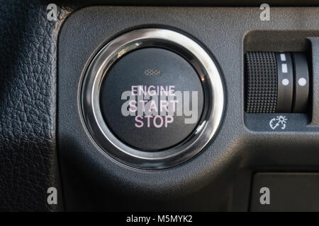 Engine start stop button of a car Stock Photo