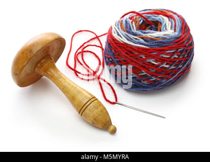 darning mushroom, yarn ball and needle Stock Photo