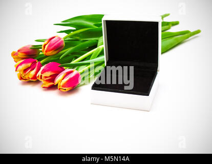 Open empty gift box, spring tulips. Women gift concept Stock Photo