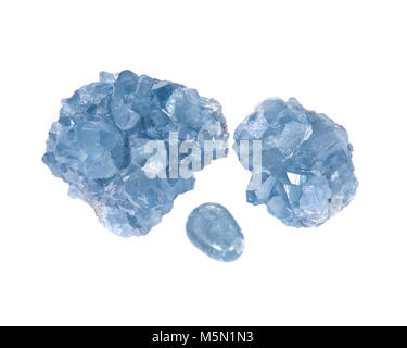 Blue celestite cluster and polished celestite palm stone isolated on white background Stock Photo