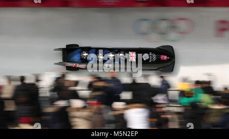 Great Britain's Lamin Deen and his team during the 4-man Bobsleigh at the Olympic Sliding Centre during day fifteen of the PyeongChang 2018 Winter Olympic Games in South Korea. Stock Photo