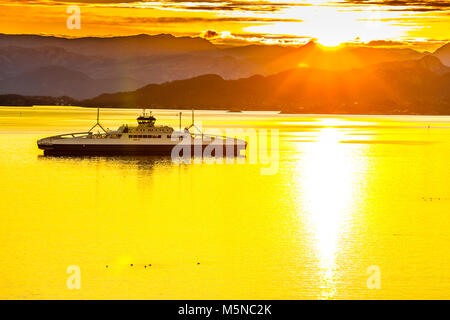 Sunrise over the mountains and the sea in Norway. Stock Photo