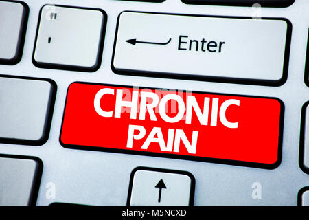 Handwriting Announcement text showing Chronic Pain. Business concept for Feeling Bad ill Care written on red key the keybord background. Stock Photo