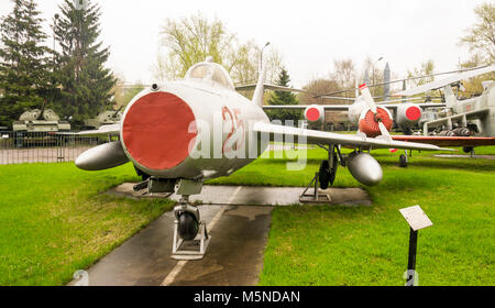 Vintage Soviet Russian grey jet fighter parked outdoor Stock Photo