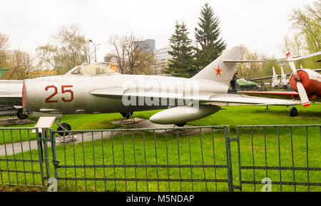 Vintage Soviet Russian grey jet fighter parked outdoor Stock Photo