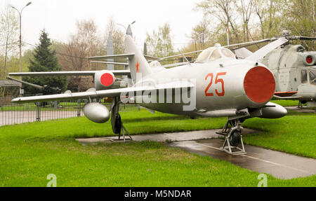 Vintage Soviet Russian grey jet fighter parked outdoor Stock Photo