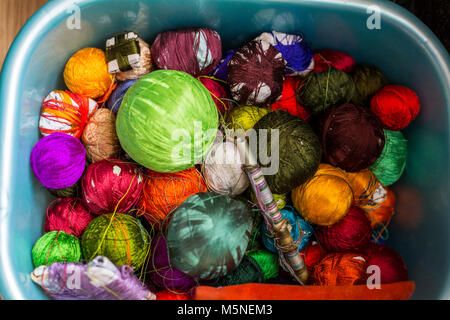 Thimphu, Bhutan.  Weaver's Basket of Colored Thread. Stock Photo