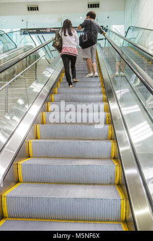 Miami Florida International Airport MIA,terminal,gate,escalator,going up,looking FL120616034 Stock Photo