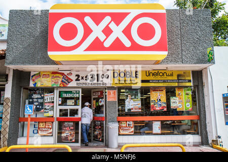 Cancun Mexico,Mexican,Avenida Tulum,Oxxo,chain,convenience store,grocer,retail chain,shopping shopper shoppers shop shops market markets marketplace b Stock Photo