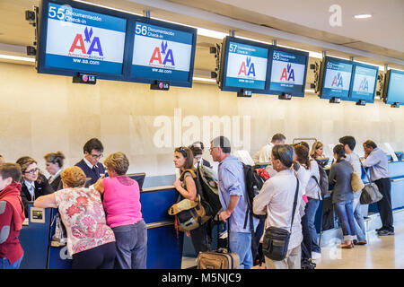 Cancun Mexico,Mexican,Cancun International Airport,aviation,ticket counter,check in,American Airlines,carrier,passenger passengers rider riders,depart Stock Photo