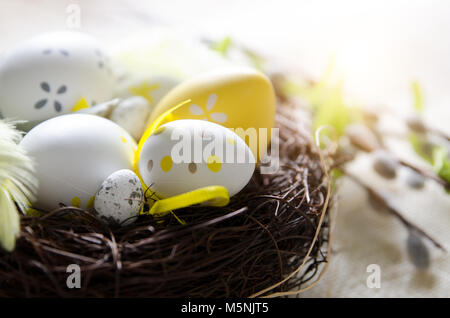 Easter eggs decoration, eggs in the nest, springtime rural composition Stock Photo