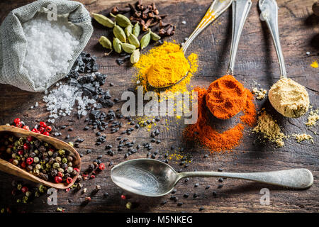 Fresh condiments on old board Stock Photo