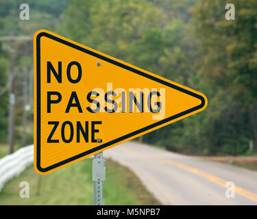 No passing zone sign on the rural country road Stock Photo