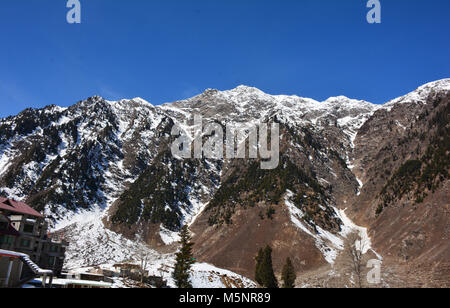 Snow covered mountain showing extreme winter conditions Stock Photo