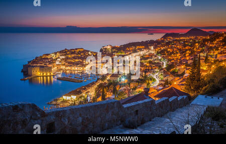 Panoramic aerial view of the historic town of Dubrovnik, one of the most famous tourist destinations in the Mediterranean Sea, in beautiful evening tw Stock Photo