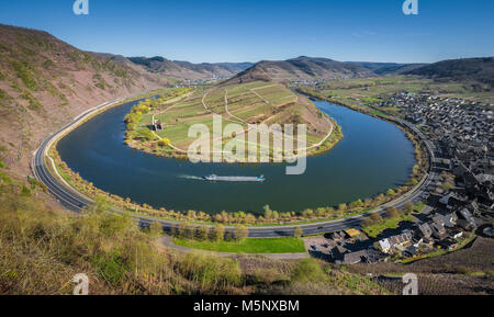Panoramic view of ship on famous Moselle river at Moselschleife with the historic town of Bremm on a sunny day in summer, Rheinland-Pfalz, Germany