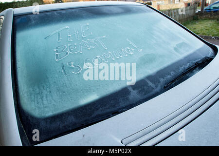 Chippenham, UK, 25th February, 2018.  As the UK awaits the arrival of a cold blast of air known as the 'beast from the east' a frozen car windscreen is pictured in Chippenham,Wiltshire. The severe cold weather is expected to hit most of the UK next week and forecasters say the freezing weather could bring travel disruption to large parts of the country. Credit: lynchpics/Alamy Live News Stock Photo
