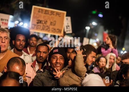 Tel Aviv, Israel. 24th Feb, 2018. Asylum seekers take part in a protest against deportation in Tel Aviv, Israel, 24 February 2018. Israel considers the vast majority of the nearly 40,000 migrants to be job seekers and says that it has no legal obligation to keep them. Credit: Ilia Yefimovich/dpa/Alamy Live News Stock Photo