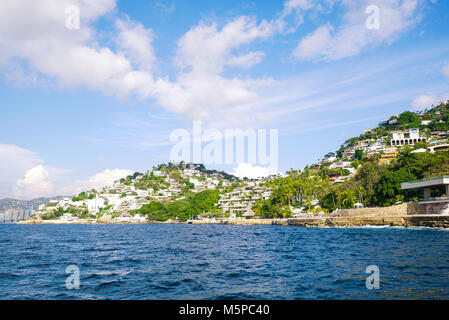 View of Acapulco Bay hotels and beach in Caleta Stock Photo